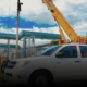 Dice Contracting crane and vehicle at fire rectification works site.